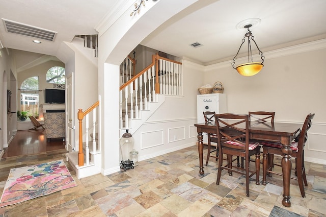 dining area with ornamental molding