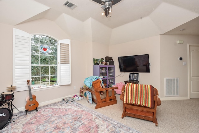 playroom featuring carpet flooring and vaulted ceiling