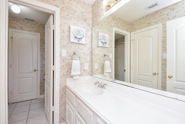 bathroom featuring vanity and tile patterned flooring