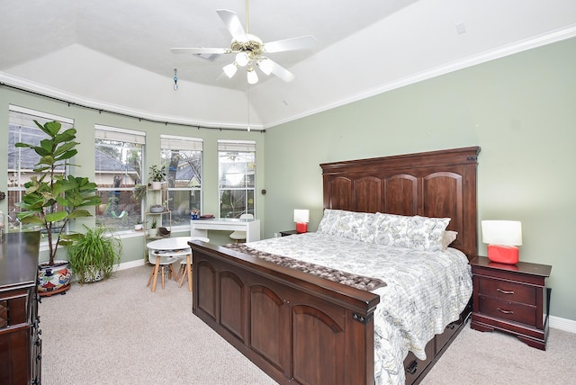 bedroom with lofted ceiling, ceiling fan, crown molding, and light colored carpet