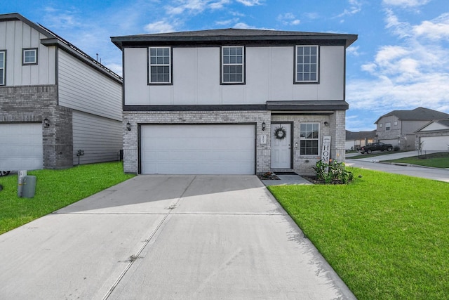 front facade with a front lawn and a garage