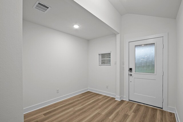 5822 Dawning Sun St, Fulshear, TX 77441 - entryway with wood finished floors and baseboards