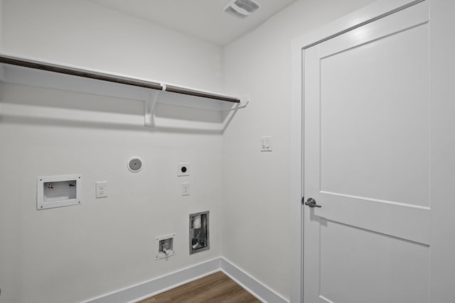5822 Dawning Sun St, Fulshear, TX 77441 - laundry area featuring baseboards, dark wood finished floors, hookup for an electric dryer, washer hookup, and hookup for a gas dryer