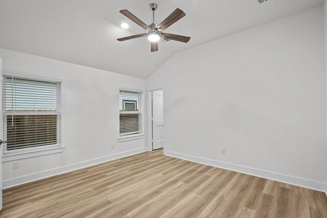 5822 Dawning Sun St, Fulshear, TX 77441 - spare room featuring vaulted ceiling, light wood finished floors, a ceiling fan, and baseboards