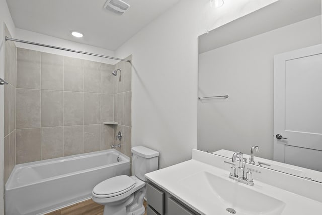 5822 Dawning Sun St, Fulshear, TX 77441 - bathroom featuring toilet, vanity,  shower combination, wood finished floors, and recessed lighting