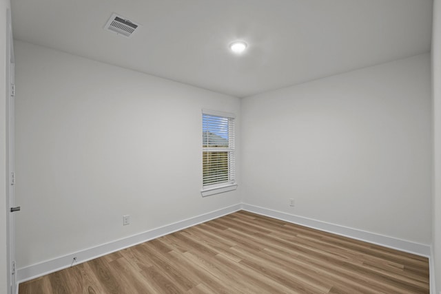 5822 Dawning Sun St, Fulshear, TX 77441 - unfurnished room featuring baseboards and light wood-style flooring