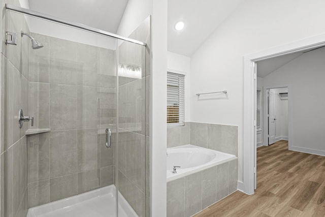 5822 Dawning Sun St, Fulshear, TX 77441 - bathroom with vaulted ceiling, a garden tub, a stall shower, wood finished floors, and recessed lighting