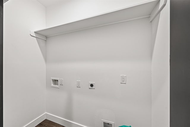 laundry area with electric dryer hookup, dark wood-type flooring, and washer hookup