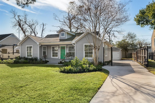 bungalow-style home featuring a front yard