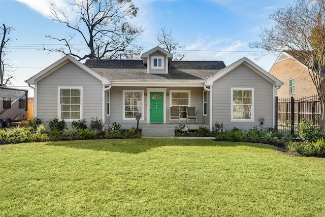 ranch-style house with a front lawn