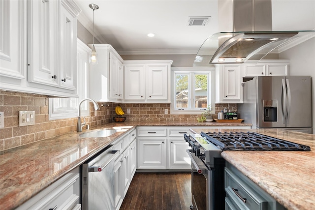 kitchen with stainless steel appliances, crown molding, pendant lighting, sink, and white cabinetry