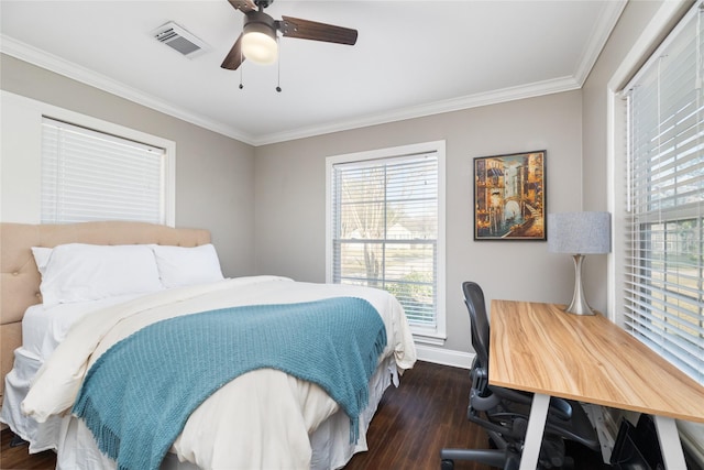 bedroom featuring ceiling fan, dark hardwood / wood-style flooring, and ornamental molding