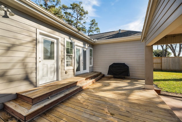 deck featuring grilling area and french doors