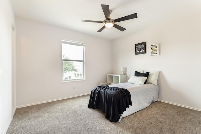 bedroom featuring ceiling fan and carpet flooring