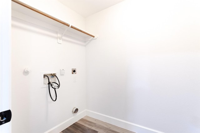 clothes washing area featuring washer hookup, hookup for an electric dryer, and wood-type flooring