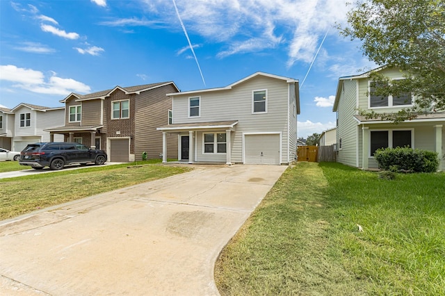 view of front of house featuring a front lawn and a garage