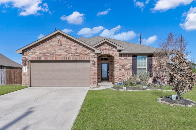 single story home with a front yard and a garage