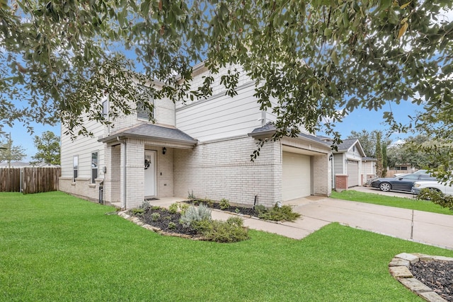 view of front facade with a front lawn and a garage