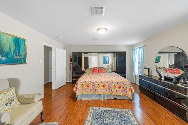 bedroom featuring hardwood / wood-style flooring