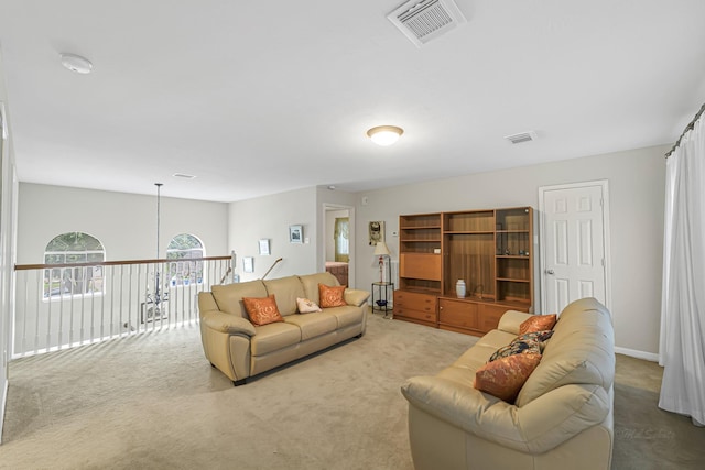 living room with light colored carpet