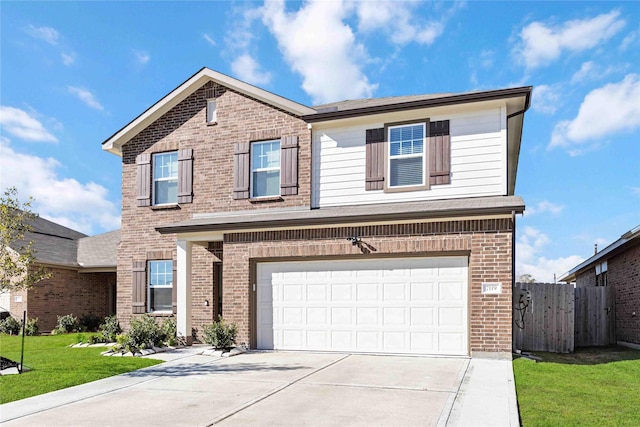 front of property with a front lawn and a garage