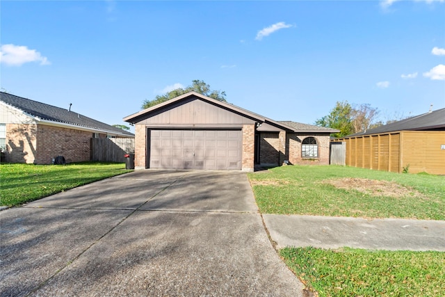 ranch-style home featuring a garage and a front lawn