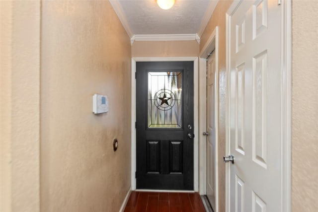 doorway to outside featuring a textured ceiling, ornamental molding, and dark hardwood / wood-style flooring