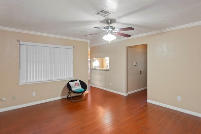 unfurnished room with a textured ceiling, ceiling fan, hardwood / wood-style flooring, and crown molding