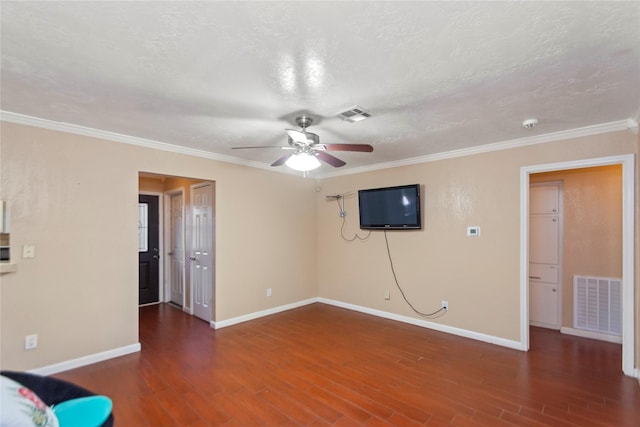 interior space with a textured ceiling, ceiling fan, crown molding, and dark hardwood / wood-style floors