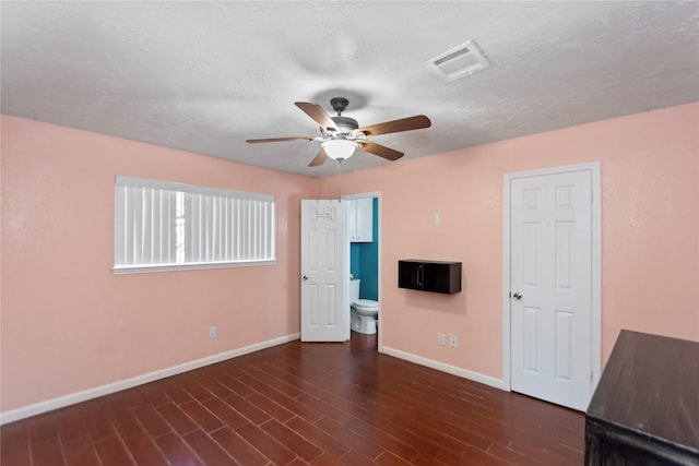 unfurnished room with a textured ceiling and ceiling fan