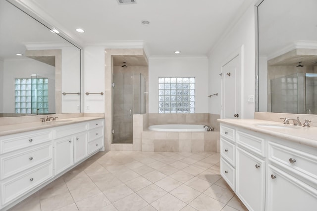 bathroom with independent shower and bath, vanity, crown molding, and tile patterned floors