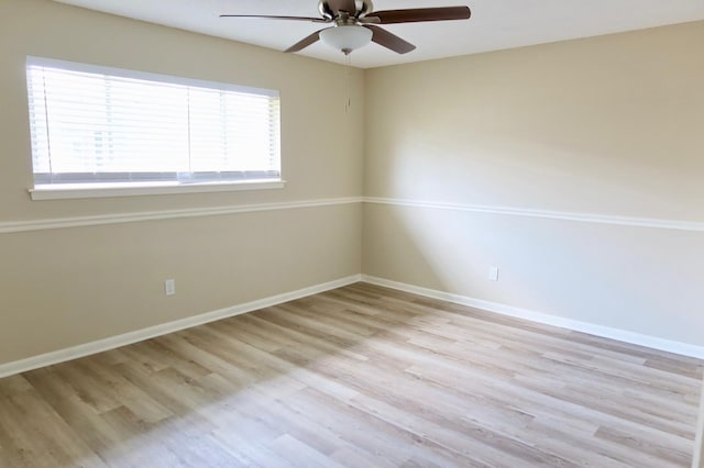 unfurnished room with ceiling fan and light hardwood / wood-style flooring