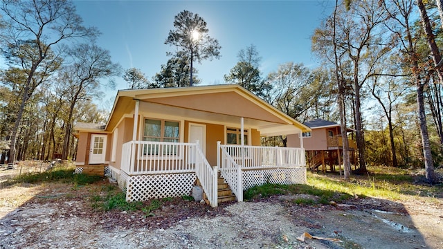 bungalow-style home featuring covered porch