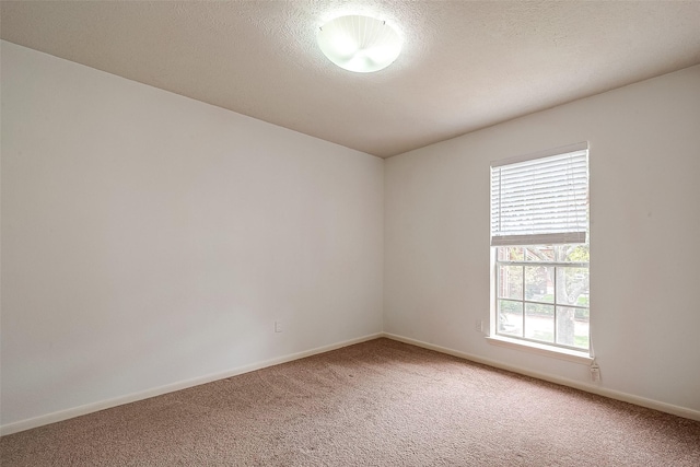 empty room with carpet flooring