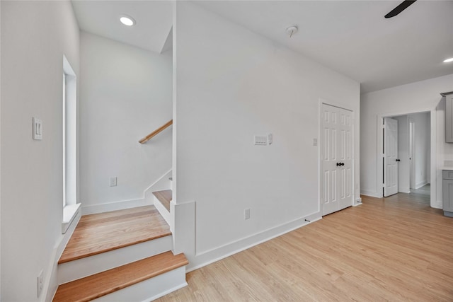 stairway featuring hardwood / wood-style floors