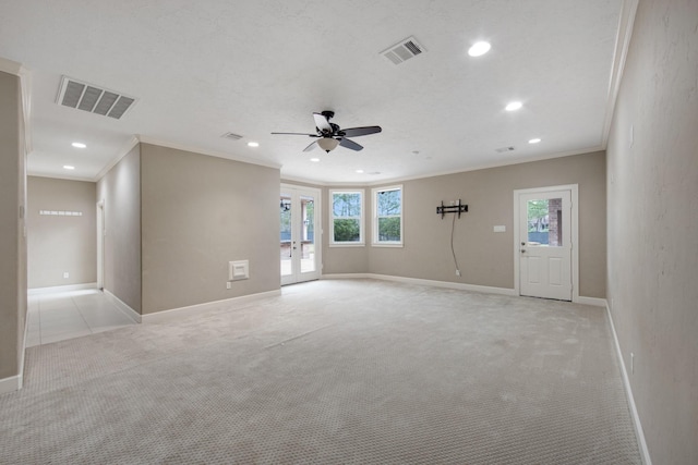 interior space with light carpet, ceiling fan, crown molding, and plenty of natural light