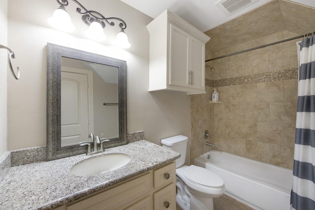 full bathroom featuring toilet, vanity, and shower / bathtub combination with curtain