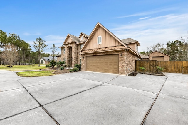 view of front of house featuring a garage and a front yard