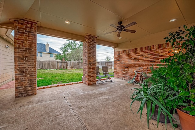 view of patio / terrace featuring ceiling fan