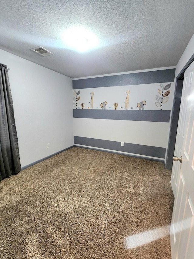 interior space featuring a textured ceiling