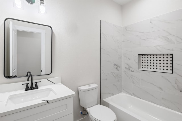 full bathroom with toilet, vanity, and tiled shower / bath combo