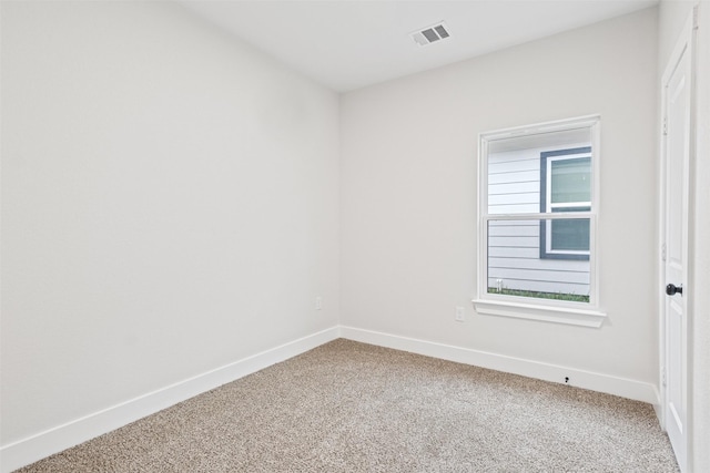 spare room with carpet flooring