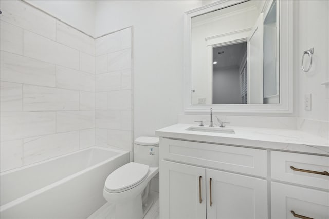 full bathroom with toilet, tiled shower / bath combo, and vanity