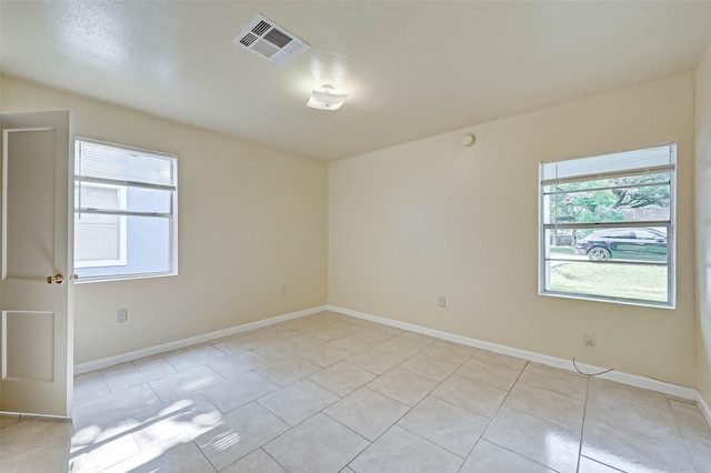 view of tiled spare room