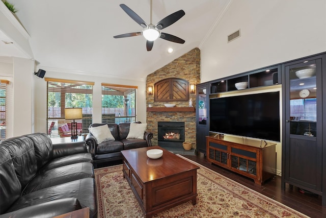 living room featuring crown molding, ceiling fan, high vaulted ceiling, dark hardwood / wood-style floors, and a fireplace