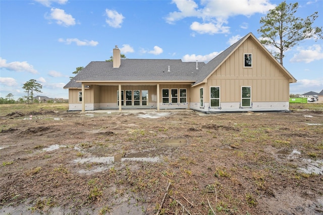 rear view of house featuring a patio