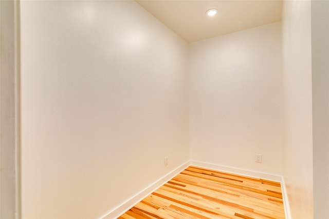 spare room featuring hardwood / wood-style flooring