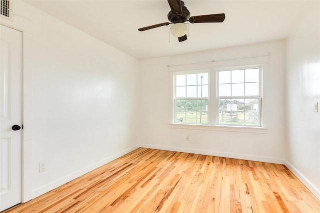 unfurnished room with ceiling fan and light hardwood / wood-style flooring