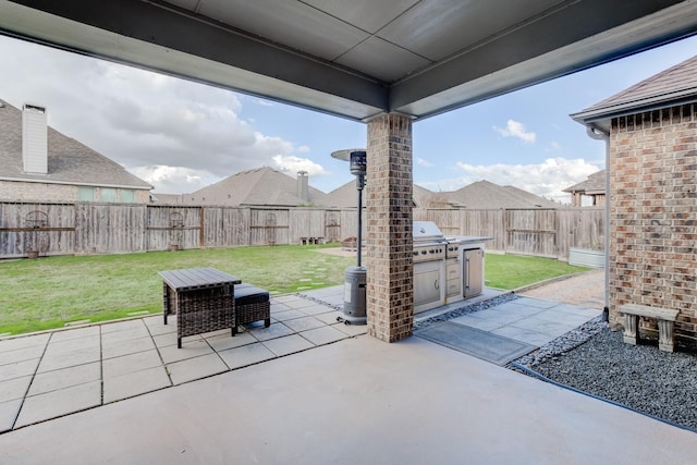 view of patio with a grill