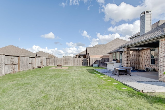 view of yard with a patio area